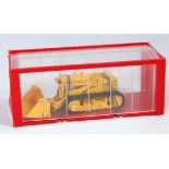 A Mini Dinky No. 95 International Skid Shovel comprising yellow body with black tracks, appears as