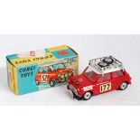 A Corgi Toys No. 321 Monte Carlo BMC Mini Cooper S, comprising red body with white roof and red