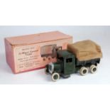 A Britains British Army series No.1432 ten wheel covered tender comprising of dark green body with