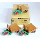A Dinky Toys No. 27G trade box Motocart comprising of three various Motocart models all finished