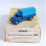 A Dinky Toys No. 30S Austin covered wagon trade box, containing one model finished in dark blue
