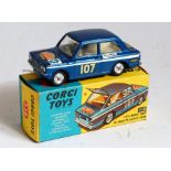 A Corgi Toys No. 328 Hillman Imp in Monte Carlo trim comprising of metallic blue body with white