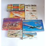 One box containing a quantity of various plastic kits to include Revell, ESCI, Frog, Merit, and