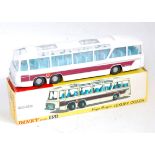 A Dinky Toys No. 954 Vega Major Luxury coach comprising white body with blue interior, cast hubs,