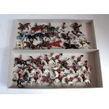 Two trays containing a quantity of various Britains, original and repainted mounted cavalry