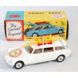 A Corgi Toys No. 475 Citroen Safari Olympic Winter Sports saloon, comprising of white body with