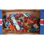 Two trays containing a quantity of play worn Corgi toys and Dinky toys, mixed examples to include