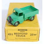 A Dinky Toys No. 25W/411 Bedford truck trade box containing one model finished in light green with