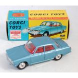 A Corgi Toys No. 252 Rover 2000 comprising of metallic light blue body with red interior and spun