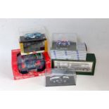 One box containing a large quantity of mixed 1/43 scale racing diecasts car transporters and