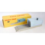 A French Dinky Toys No. 502 individual garage comprising grey and blue structure sold in the