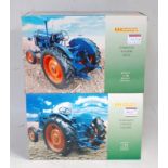 A Universal Hobbies 1/16 scale boxed farming tractor group, to include a Fordson Major E27N together