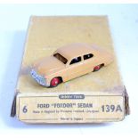 A Dinky Toys trade box No. 139A Ford Fordor sedan containing one model, the model is finished in