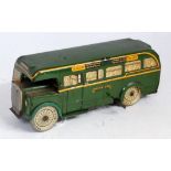 A Wells Brimtoy tinplate and clockwork Green Lines public transport bus comprising dark green and