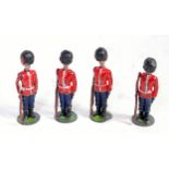 Four various Britains from set No. 111 round based Grenadier guards, some signs of overpainting, one