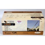 A TWH Collectables 1/50 scale model of a National Crane 1400 telescoping crane, housed in the