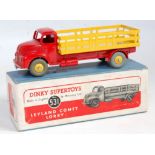 A Dinky Toys No. 531 Leyland Comet cement lorry comprising of red cab and chassis with yellow back