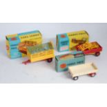 A collection of boxed Corgi Toys farming related trailers to include No. 100 dropside trailer (VG-