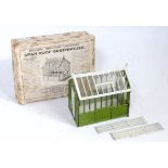 A Britains miniature garden series set No.053 span roof greenhouse comprising of two green glazed