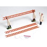 A Britains set No. 1495 Painters and Ladders set, comprising of two painters carrying ladder, one in