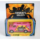 A Corgi Toys No. 434 Charlie's Angels custom delivery van comprising yellow body with amber glass