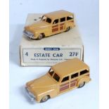 A Dinky Toys No. 27F estate car trade box containing two models, both finished in tan and brown with