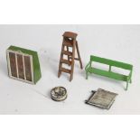 A collection of Britains garden series uncommon items to include No. 617 garden table, cold frame