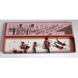 A Britains No.1283 Grenadier Guards gift set comprising of eight Grenadier Guards soldiers in a