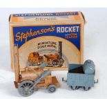 A Benbros boxed Stephensons Rocket with coal tender, comprising of gold and silver Stephensons