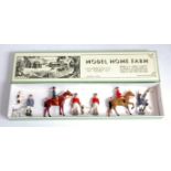 A Britains Hunt series hunting figure and hounds group to include two mounted hunt figures, together