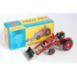 A Corgi Toys No. 69 Massey Ferguson 165 tractor with shovel comprising of red, white and grey body