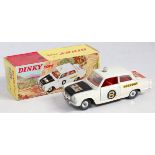 A Dinky Toys No. 212 Ford Cortina Rally Car comprising of white and black body with red interior and