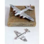 A Dinky Toys No. 62G Boeing Flying Fortress monoplane comprising silver body with four 3-blade red
