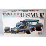 A Kyosho and Tamiya complete and part built plastic kit group, to include a complete Kyosho 1/18