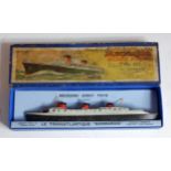 A Dinky Toys pre-war No. 52C La Normandie Ocean Liner, comprising white and black body with brown
