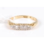 A lady's 18ct gold five stone diamond ring, the graduated old cut diamonds in a line setting, 2.