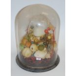 A Victorian waxed fruit display beneath glass dome on ebonised plinth, height 44cm