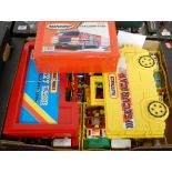 One box to include three Matchbox carry cases all with cars inside, and five trays of Matchbox