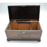 An early Victorian rosewood tea caddy, of sarcophagus form, w.33cm