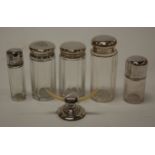 Assorted silver topped glass dressing table bottles (5), together with a silver and mother of