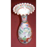 A large Japanese late Meiji period floor vase, having a wavy rim and of mid-baluster form, enamel