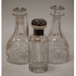 A pair of cut crystal small decanters and stoppers, 20th century, height 18cm, together with a cut