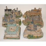 A collection of boxed cottage ornaments, to include Danbury Mint Mont St Michel in France,