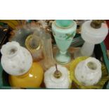 Assorted glass oil lamp parts to include yellow tinted and acid etched shade