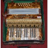 A Vissimio faux marble cased piano accordion