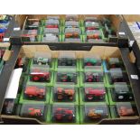 Two boxes of modern issue diecast tractors