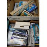 Two boxes of assorted model aircraft kits together with assembled warships etc