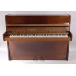 A Bluthner mahogany cased iron framed cross strung upright piano,