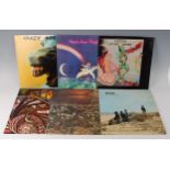 A collection of six LP's to include