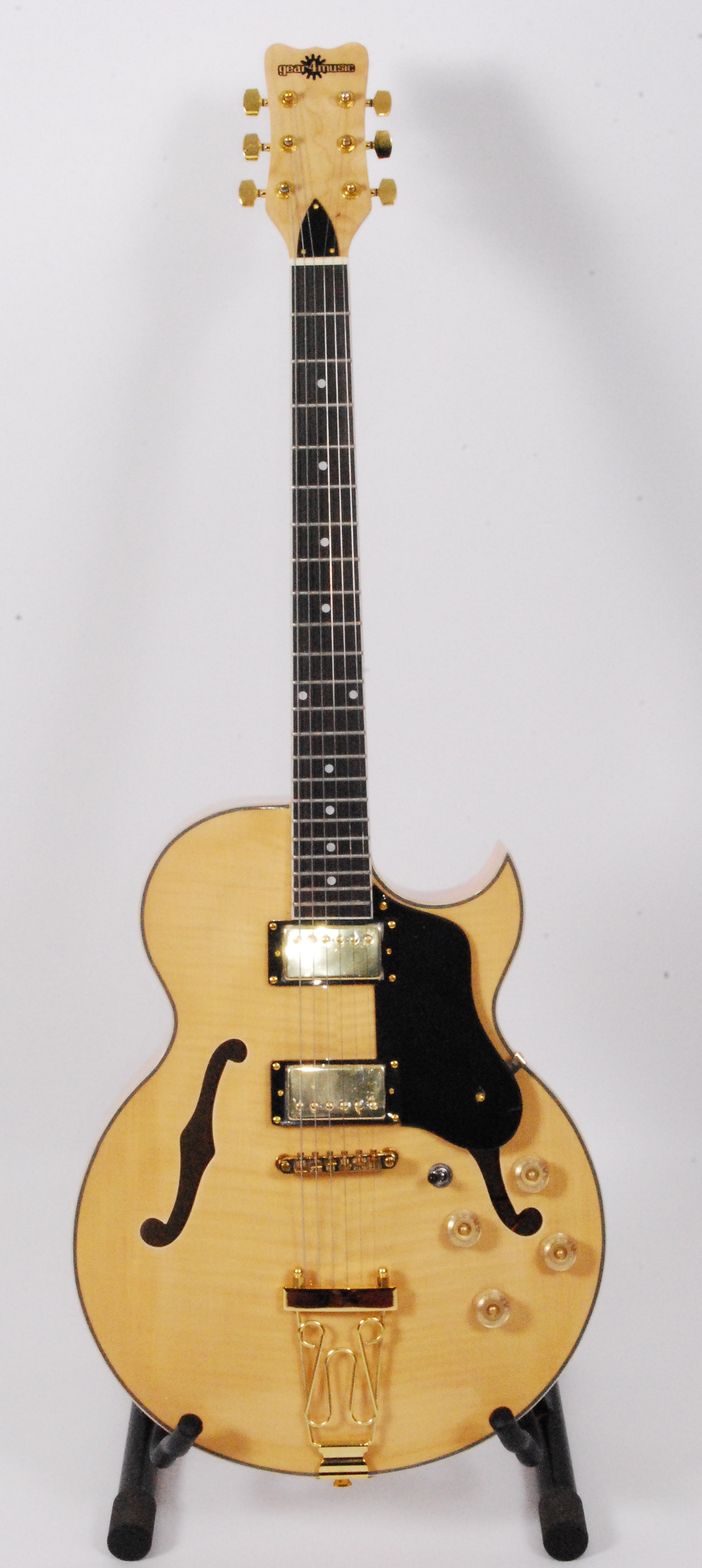 A Gear4music ES/295 electro/accoustic guitar, in natural finish